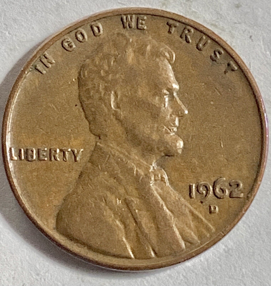 Side-by-side comparison of common 1962-D penny mint mark versus 1962-D RPM showing secondary D impression