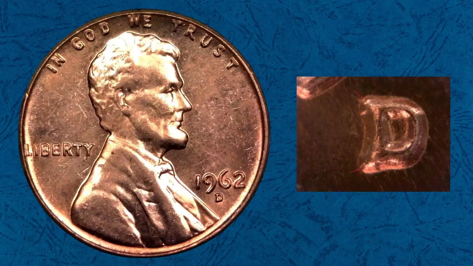 Close-up of 1962-D penny repunched mint mark showing secondary D impression overlapping primary mint mark